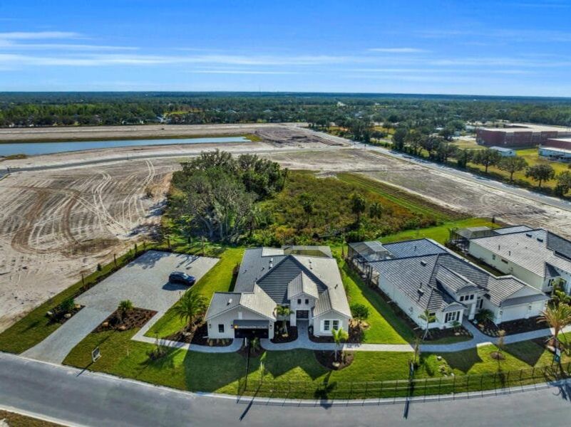 Aerial view of the River Preserve Estates community in Parrish, FL, showing layout and nearby surroundings (Image 1). Aerial view of the River Preserve Estates community in Parrish, FL, showing layout and nearby surroundings (Image 1).