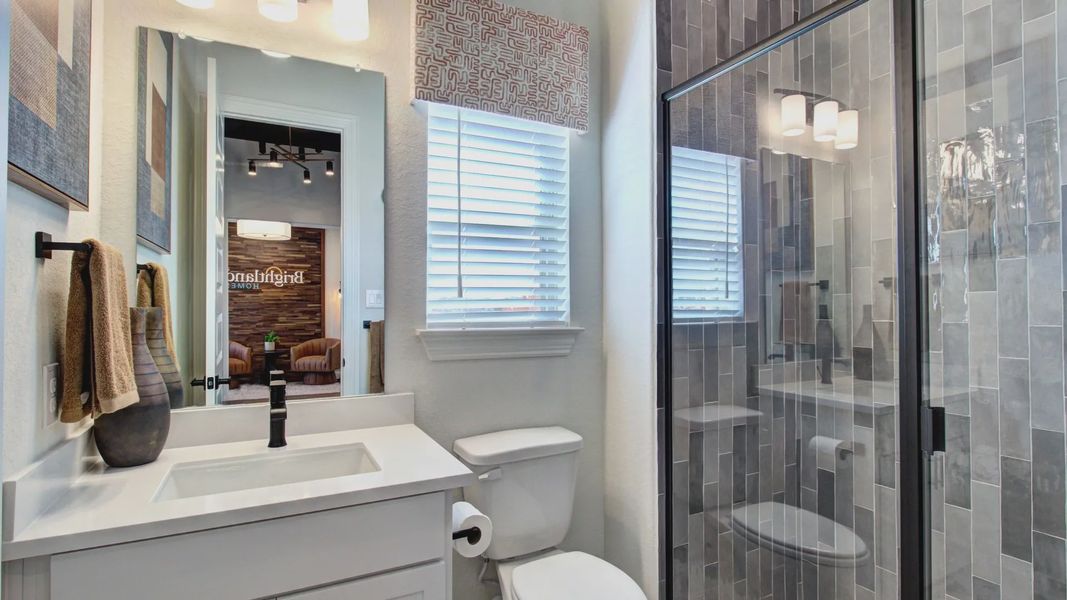 Elegant glass shower and modern vanity offer a sophisticated touch in this Meyer Ranch bathroom. Elegant glass shower and modern vanity offer a sophisticated touch in this Meyer Ranch bathroom.
