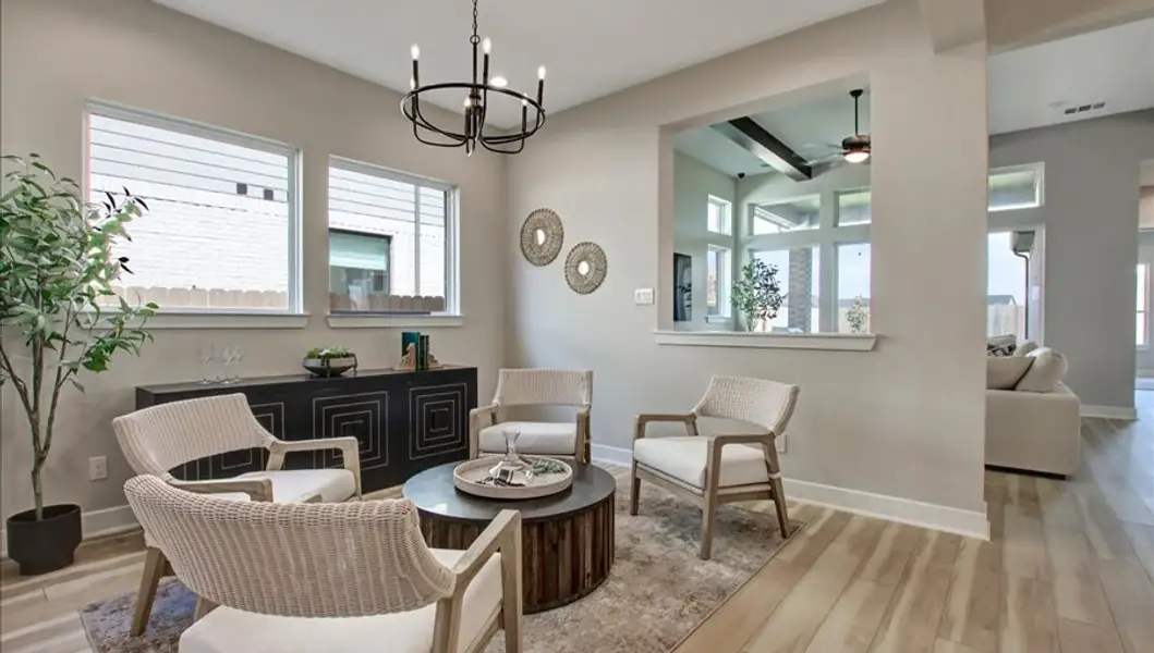 Furnished interior in a model home at Sunterra 40 in Katy (Image 8).