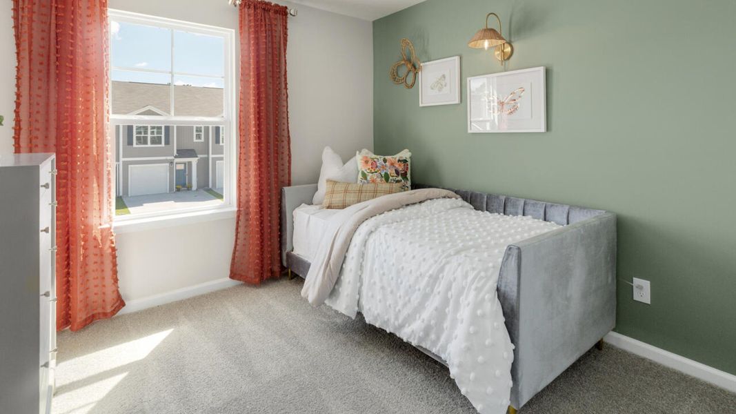 Furnished interior in a model home at Grayson Park Townhomes in Leland (Image 40).