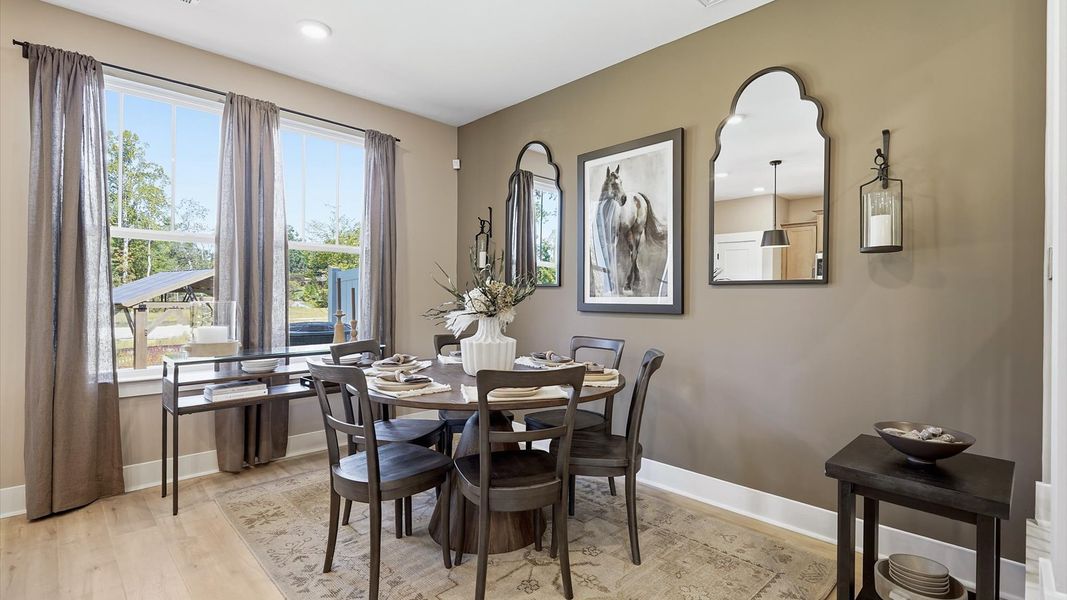Inviting breakfast area with a seamless connection to the kitchen for everyday living located in Hendersonville, NC