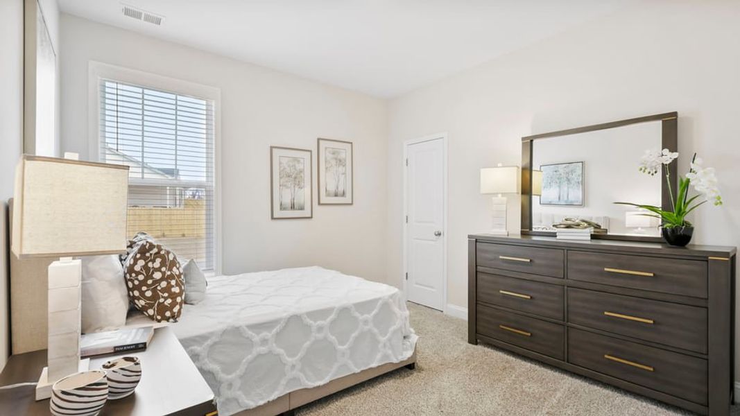 Furnished interior in a model home at Ravencrest in Roebuck (Image 21).