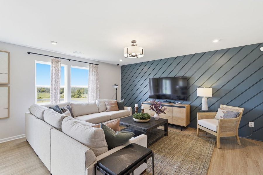 Inviting family room space to unwind, recharge, and spend time together Inviting family room space to unwind, recharge, and spend time together