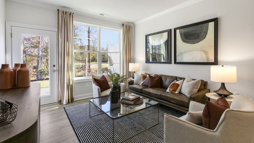 Furnished interior in a model home at The Meadows at Kinsley in Jamestown (Image 7).