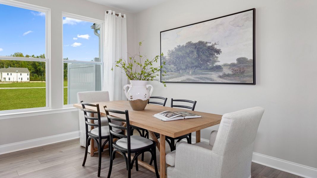 Furnished interior in a model home at Sidney Creek Townhomes in Zebulon (Image 14).