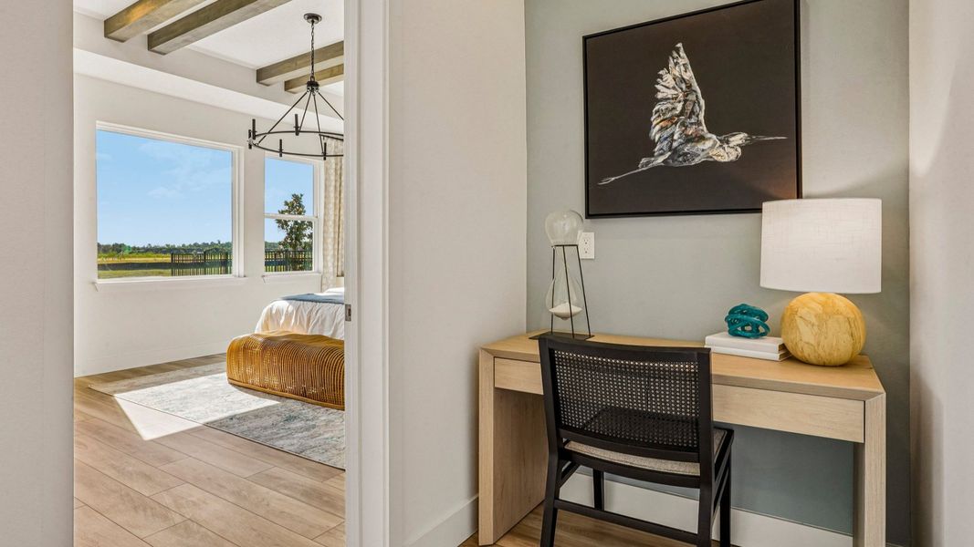 Furnished interior in a model home at Ardisia Park in New Smyrna Beach (Image 50).