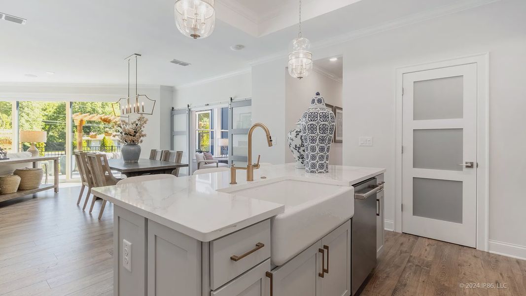 Furnished interior in a model home at The Courtyards at Redbud Lane in Holly Springs (Image 22).