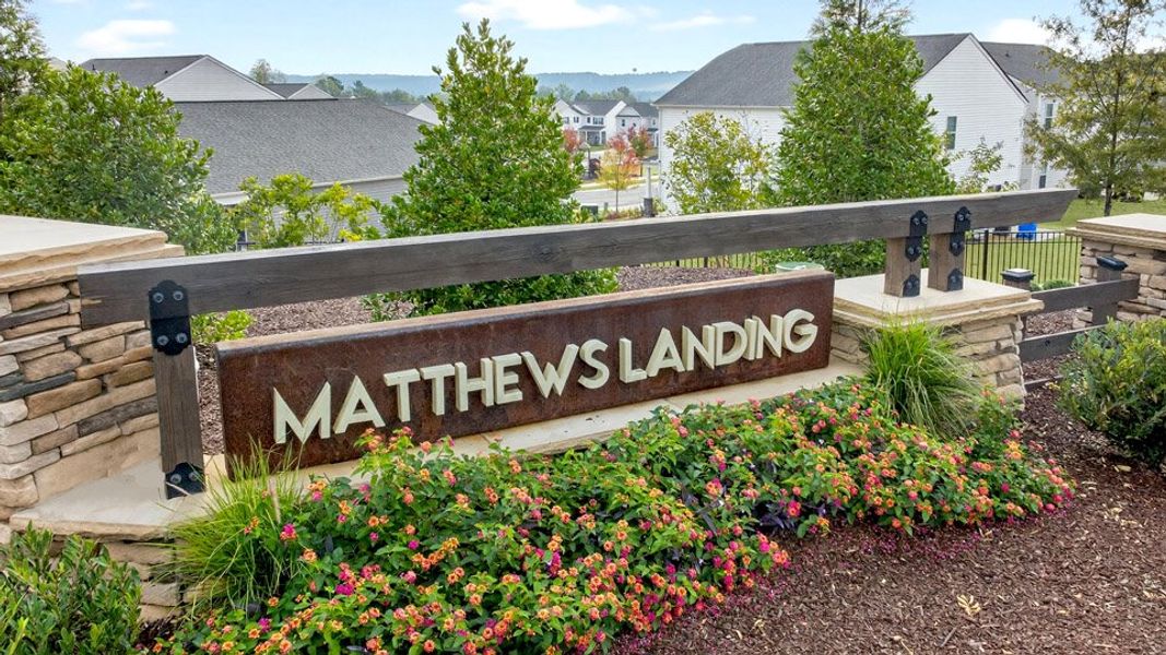 Entrance to the The Grove at Matthews Landing community in Fuquay Varina, NC, featuring signage and landscaping (Image 2).