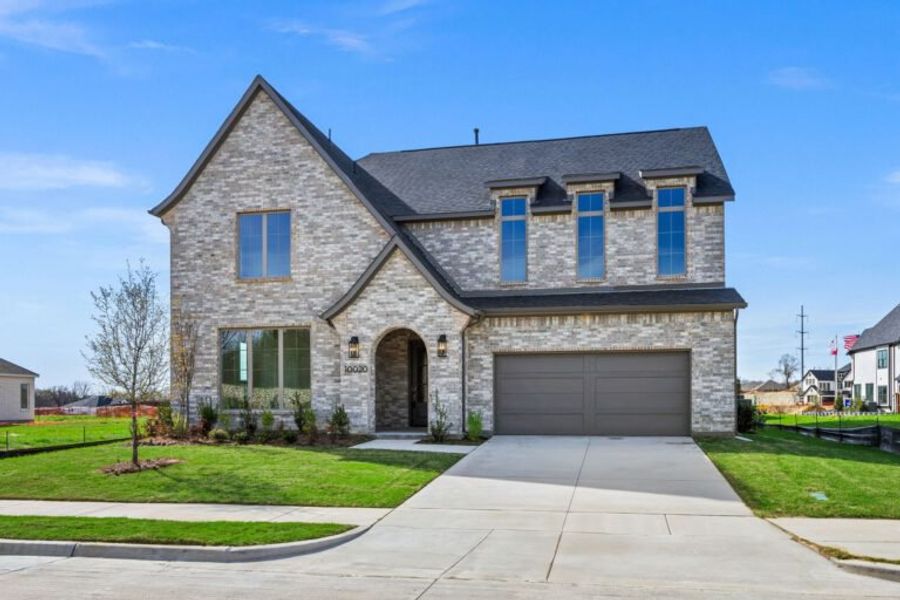 Front exterior of a home in the Chatham Reserve community, located in Providence Village, TX (Image 15). Front exterior of a home in the Chatham Reserve community, located in Providence Village, TX (Image 15).