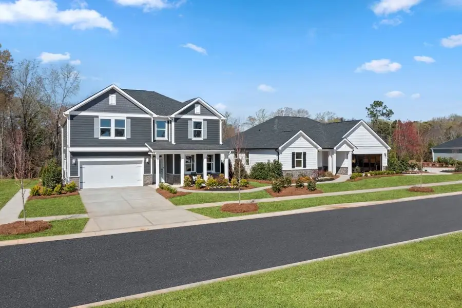 Front exterior of a home in the Wellington Pointe Executive Series community, located in Monroe, NC (Image 3). Front exterior of a home in the Wellington Pointe Executive Series community, located in Monroe, NC (Image 3).