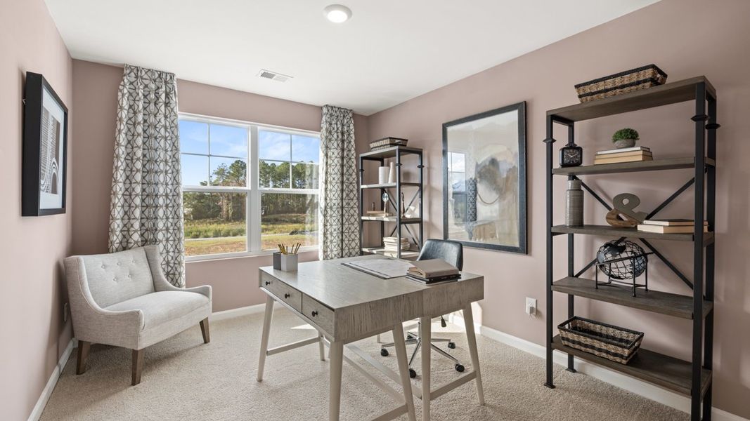Furnished interior in a model home at Oakchase at Hampton in Hampton (Image 29).
