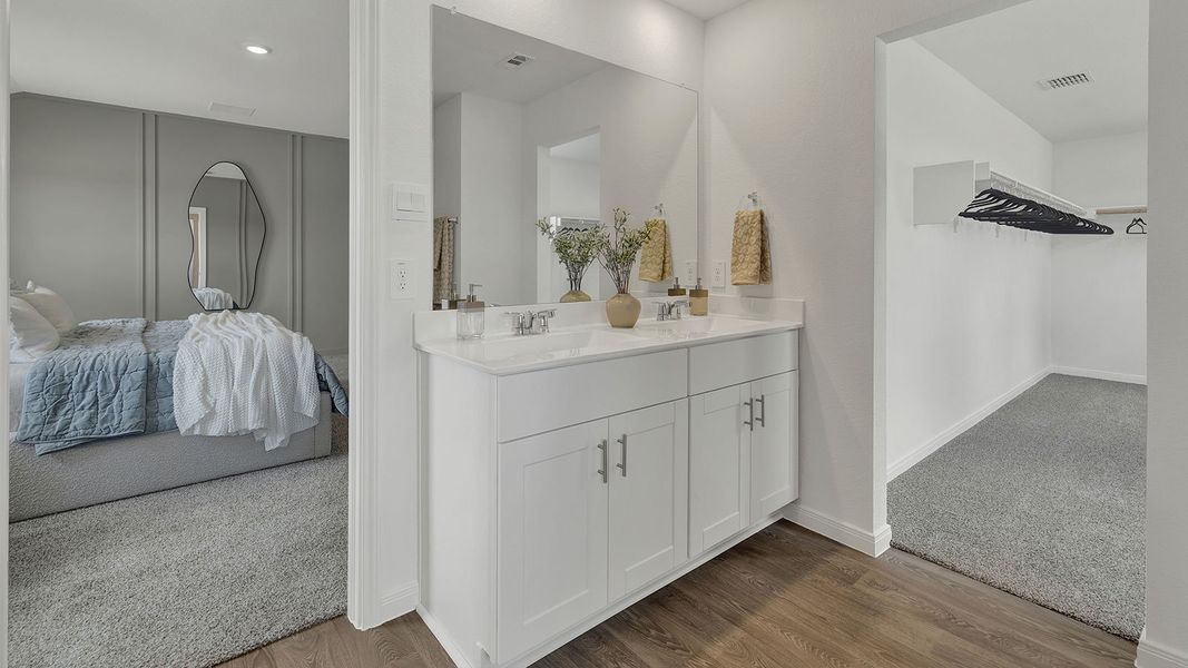 Furnished interior in a model home at Paramount in Kyle (Image 20).