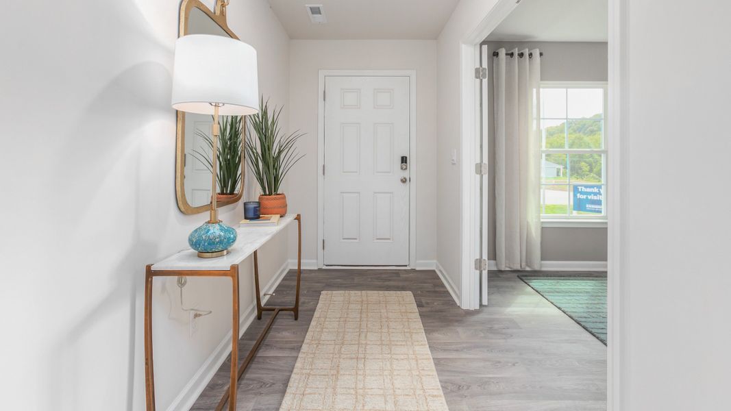 Furnished interior in a model home at Aspen Place in Thomasville (Image 4).