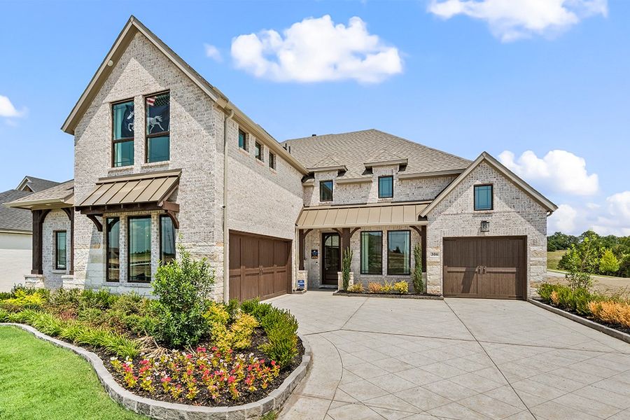 Front exterior of a home in the Park Hills community, located in Rockwall, TX (Image 3). Front exterior of a home in the Park Hills community, located in Rockwall, TX (Image 3).