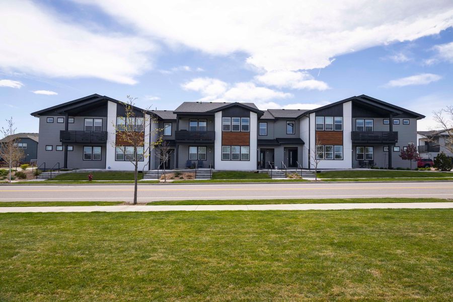 Front exterior of a home in the Raindance Condos community, located in Windsor, CO (Image 3). Front exterior of a home in the Raindance Condos community, located in Windsor, CO (Image 3).