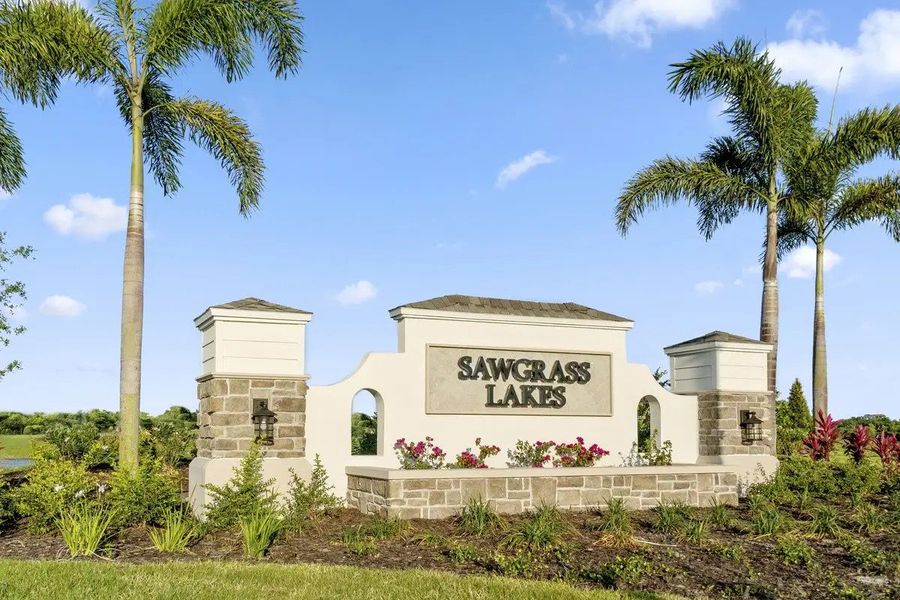 Main entrance to the Sawgrass Lakes master-planned community in Parrish, FL, featuring its landmark signage (Image 3).