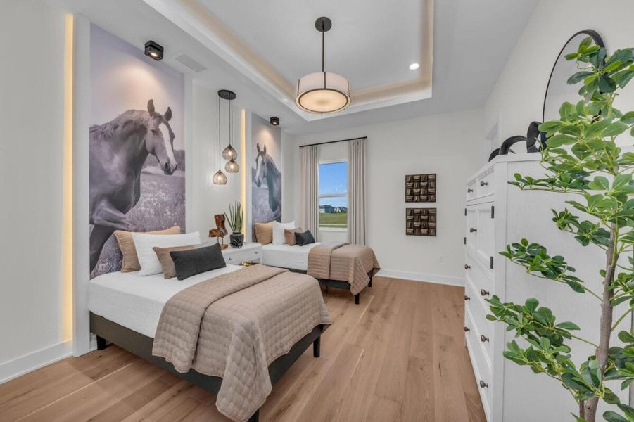 Furnished interior in a model home at Hampton Lakes in Sarasota (Image 165).