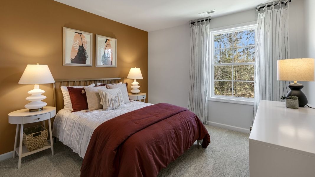 Furnished interior in a model home at The Meadows at Kinsley in Jamestown (Image 18).