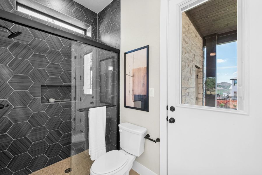 Furnished interior in a model home at Caliterra in Dripping Springs (Image 47).