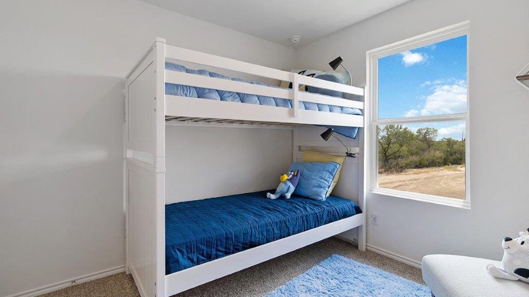 Furnished interior in a model home at Lucero in San Antonio (Image 25).