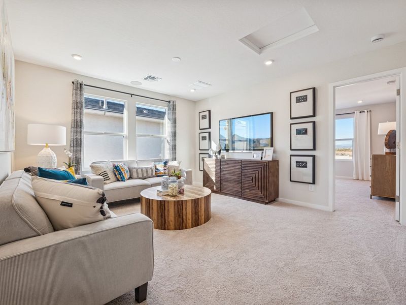 A living room with a large window.