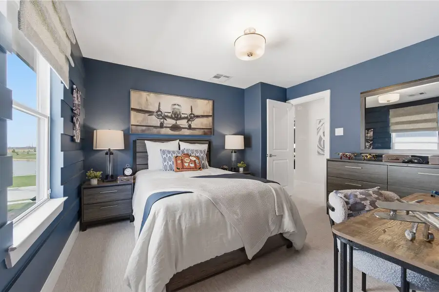 Furnished interior in a model home at Wildrye in Waller (Image 53).