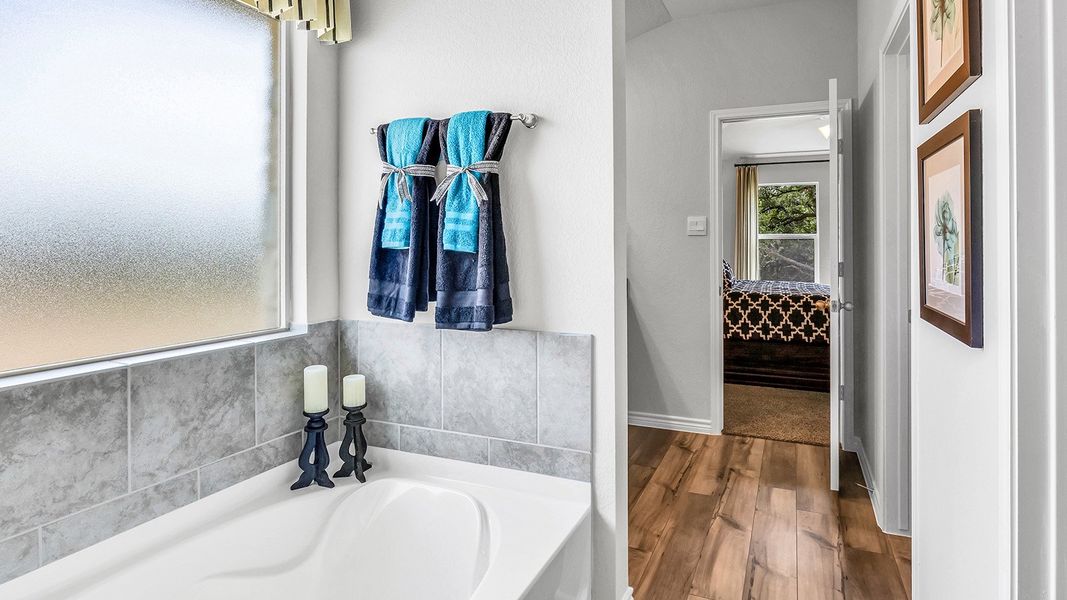 Furnished interior in a model home at Three Creeks - Colt Creek in Belton (Image 14).