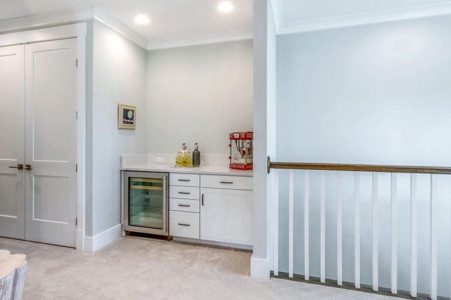 Furnished interior in a model home at Ocean Ridge in St. Augustine Beach (Image 28).