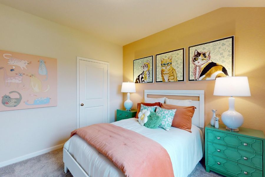 A bedroom with a bed and lamps. A bedroom with a bed and lamps.