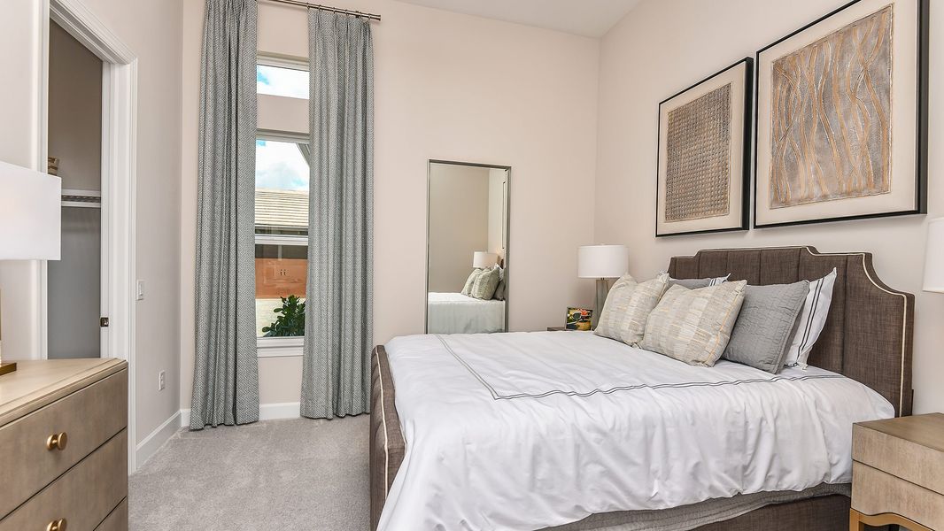 Furnished interior in a model home at Esplanade by the Islands in Naples (Image 53).