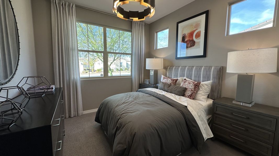 Furnished interior in a model home at CantaMia at Estrella 55+ in Goodyear (Image 36).