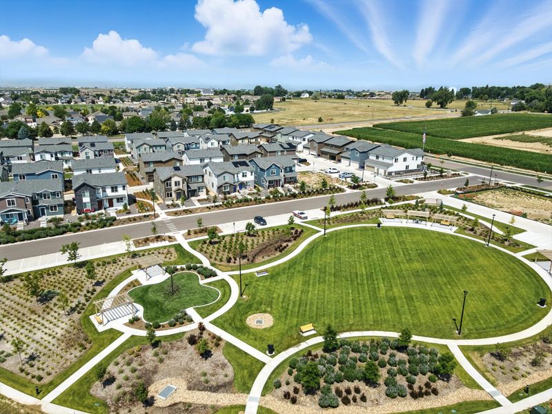 Aerial view of the Pintail Commons at Johnstown Village community in Johnstown, CO, showing layout and nearby surroundings (Image 13). Aerial view of the Pintail Commons at Johnstown Village community in Johnstown, CO, showing layout and nearby surroundings (Image 13).