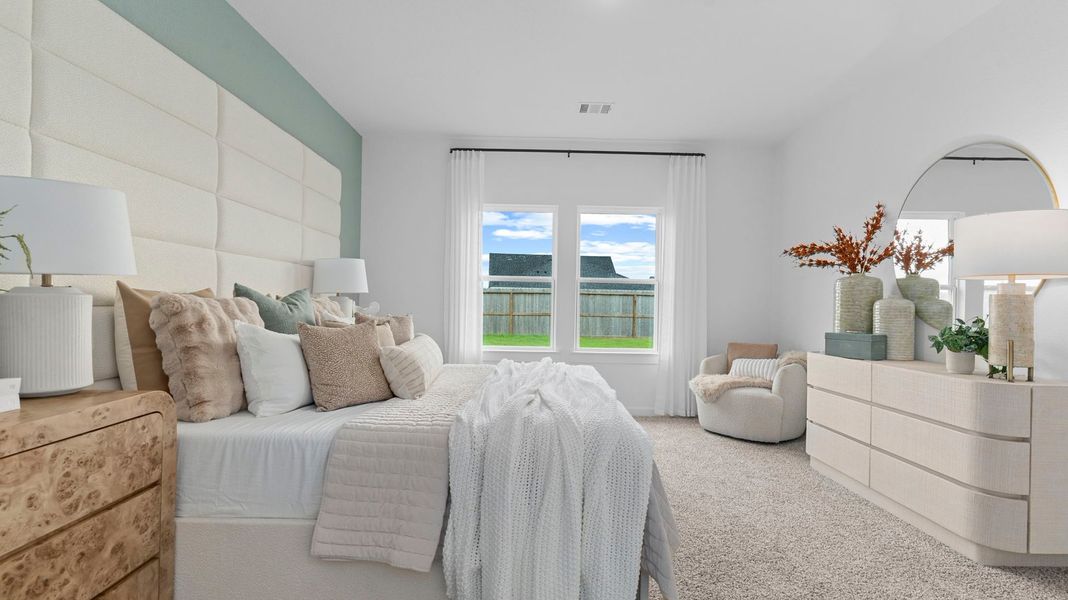 Furnished interior in a model home at Caldwell Crossing in Iowa Colony (Image 22).