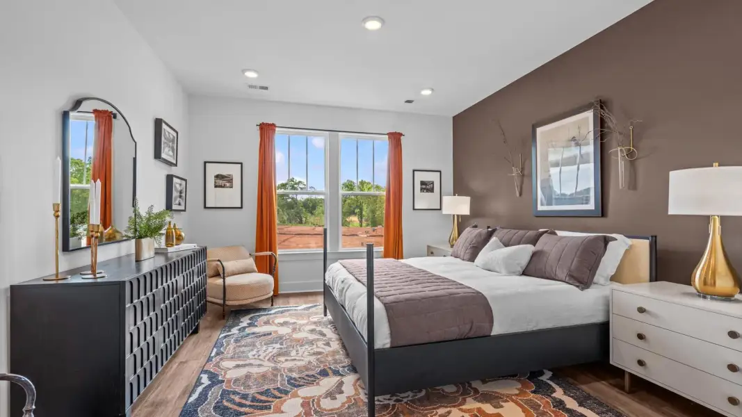 Furnished interior in a model home at Woodland Summit in Simpsonville (Image 39).
