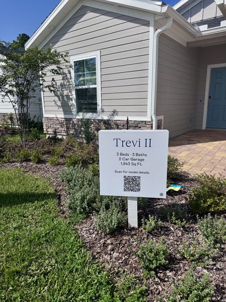 A charming home with lovely landscaping in Edenbrooke at Hyland Trail by Lennar (Green Cove Springs, FL).