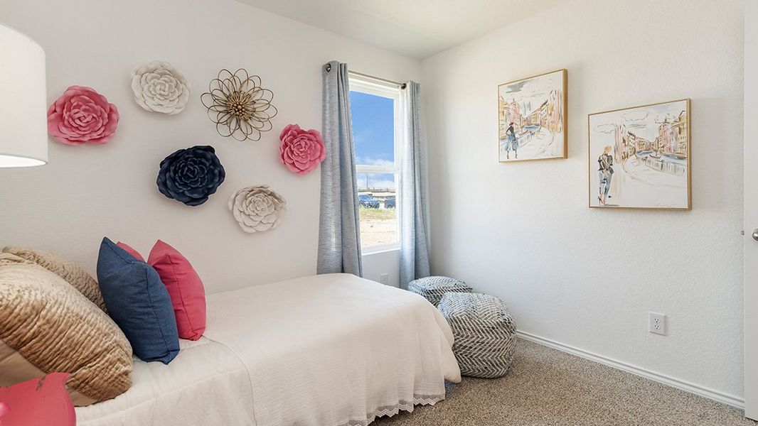 Furnished interior in a model home at Preserve at Medina in Von Ormy (Image 37).