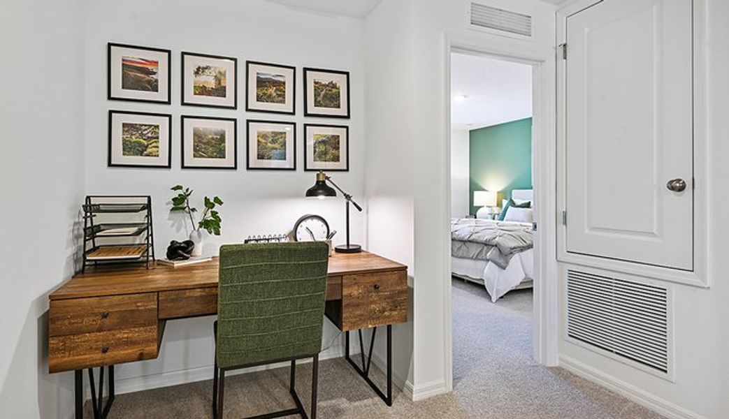 Furnished interior in a model home at The Towns at Tiburon in Nokomis (Image 10).