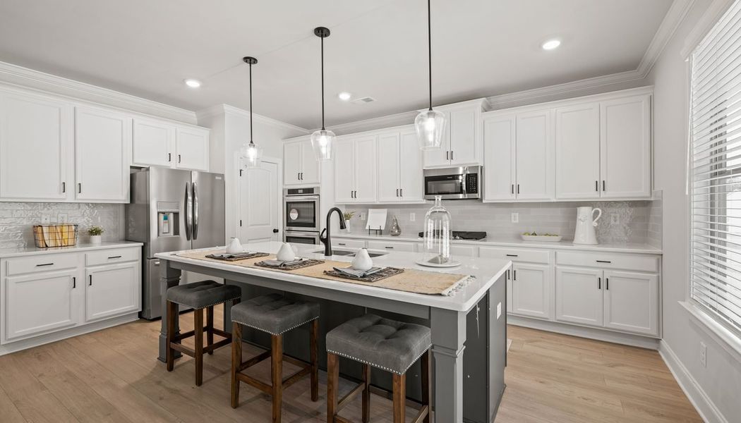 Furnished interior in a model home at Traditions of Braselton in Jefferson (Image 10).