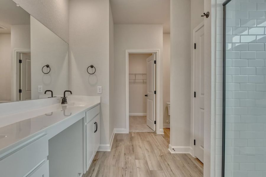 Furnished interior in a model home at Cordova Trails in Seguin (Image 19).