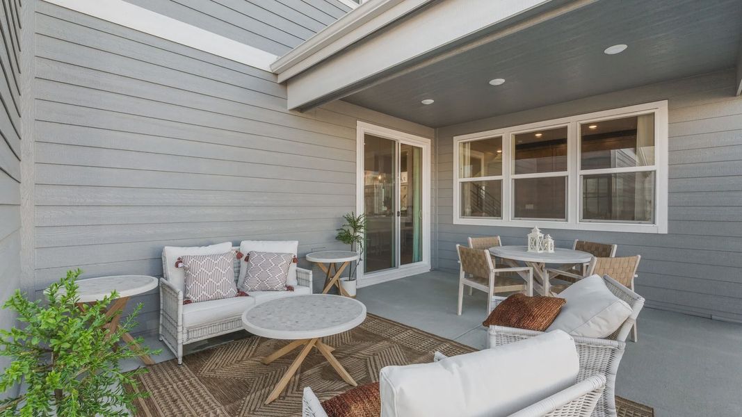 Elegant Dillon Pointe patio with sleek wooden paneling and luxurious wicker seating. Ideal for refined outdoor living. Elegant Dillon Pointe patio with sleek wooden paneling and luxurious wicker seating. Ideal for refined outdoor living.