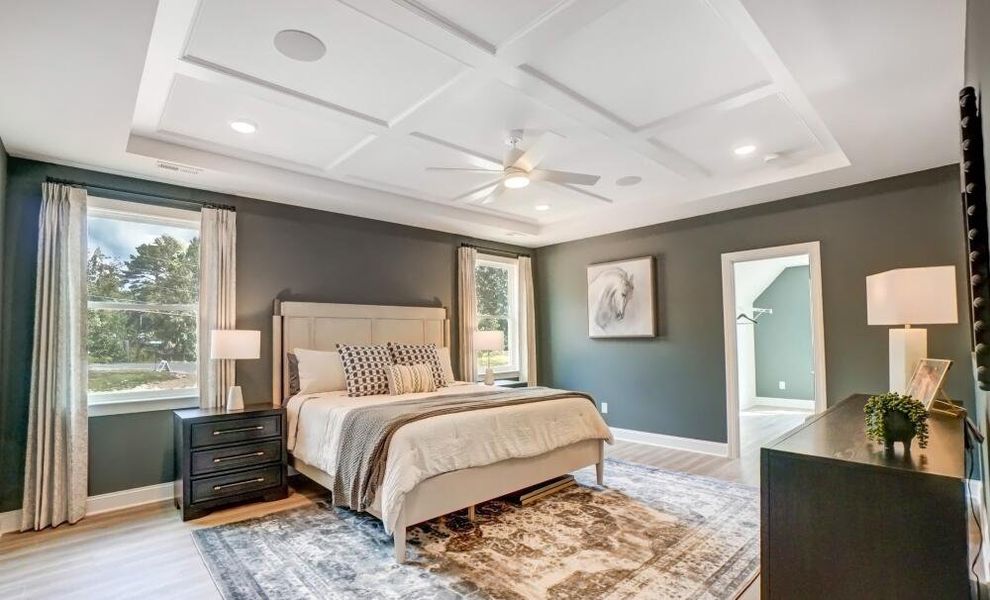 Furnished interior in a model home at Peyton's Creek in Statesville (Image 10).