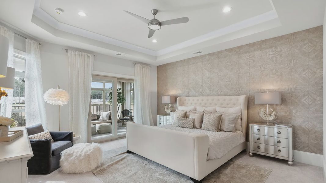 Furnished interior in a model home at Courtyards by Carrell in Ocean Isle Beach (Image 10).