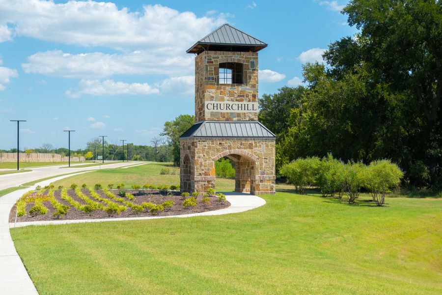 Entrance to the Churchill: Meadows 50' community in Anna, TX, featuring signage and landscaping (Image 1). Entrance to the Churchill: Meadows 50' community in Anna, TX, featuring signage and landscaping (Image 1).