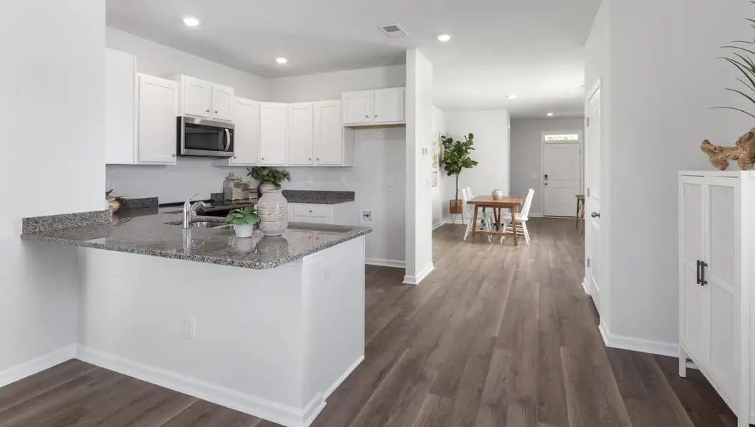 Furnished interior in a model home at Lockwood Landing in Supply (Image 4). Furnished interior in a model home at Lockwood Landing in Supply (Image 4).