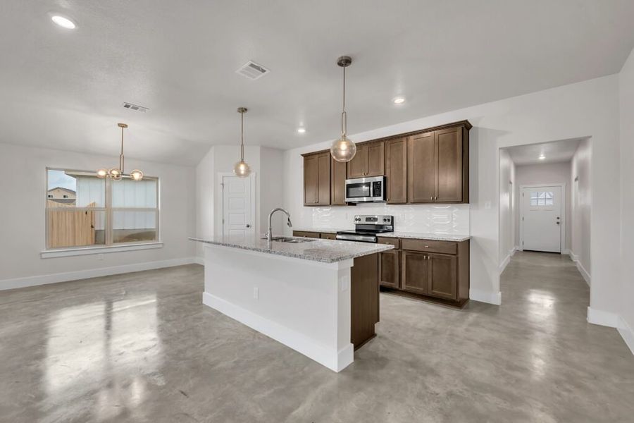 Furnished interior in a model home at Freedom Ranch Single Family in Copperas Cove (Image 3).