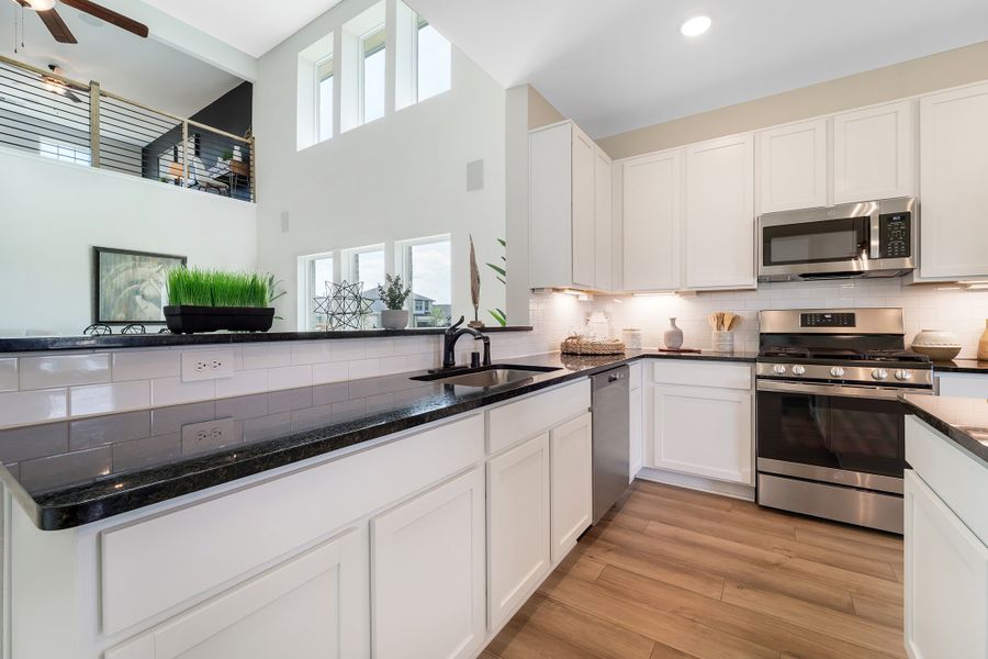 Furnished interior in a model home at Magnolia Springs in Montgomery (Image 28).