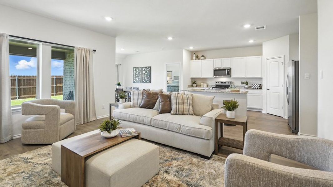 Furnished interior in a model home at Saddlebrook in Waxahachie (Image 14).