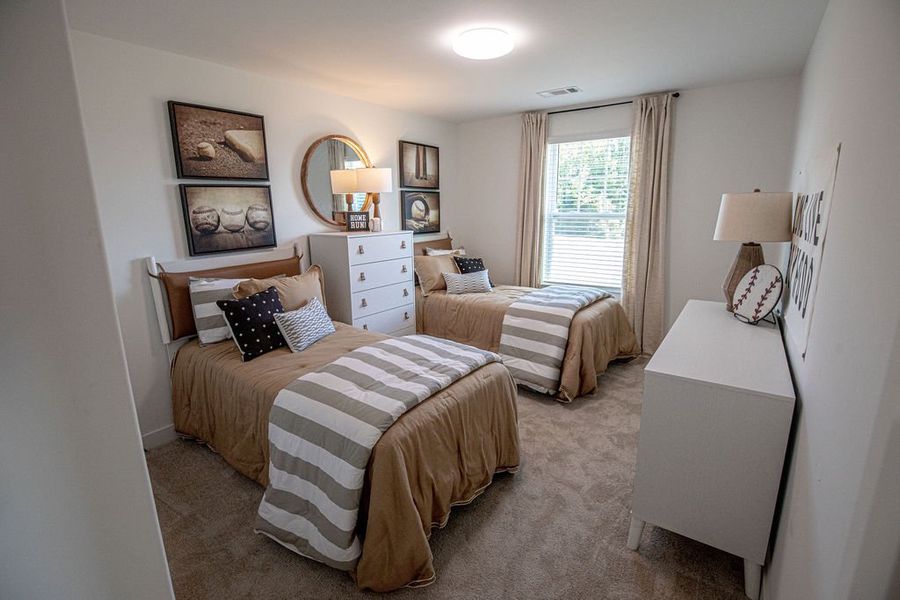 Furnished interior in a model home at The Townhomes at Union Depot in Bartlett (Image 30).