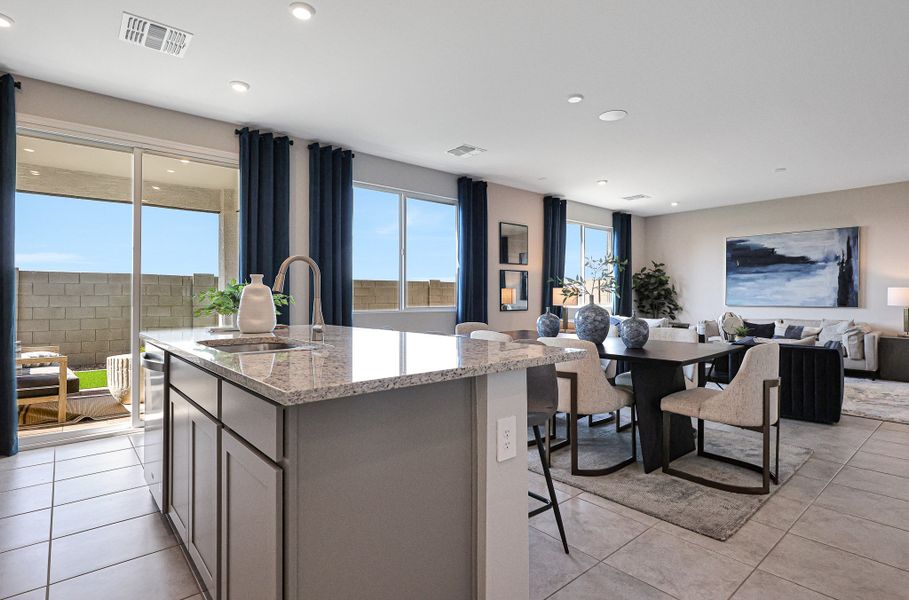 A kitchen with a large island. A kitchen with a large island.