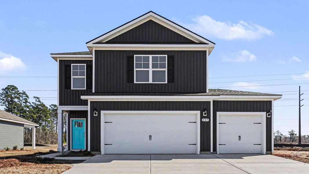 Front exterior of a home in the Preserve at Cypress Commons community, located in Conway, SC (Image 10).